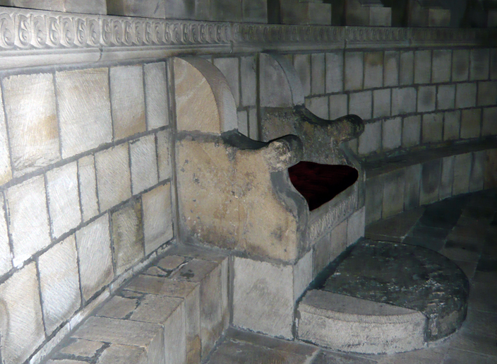 The Prior's seat in the Durham Chapterhouse and the stone ledge upon which the monks would have sat.